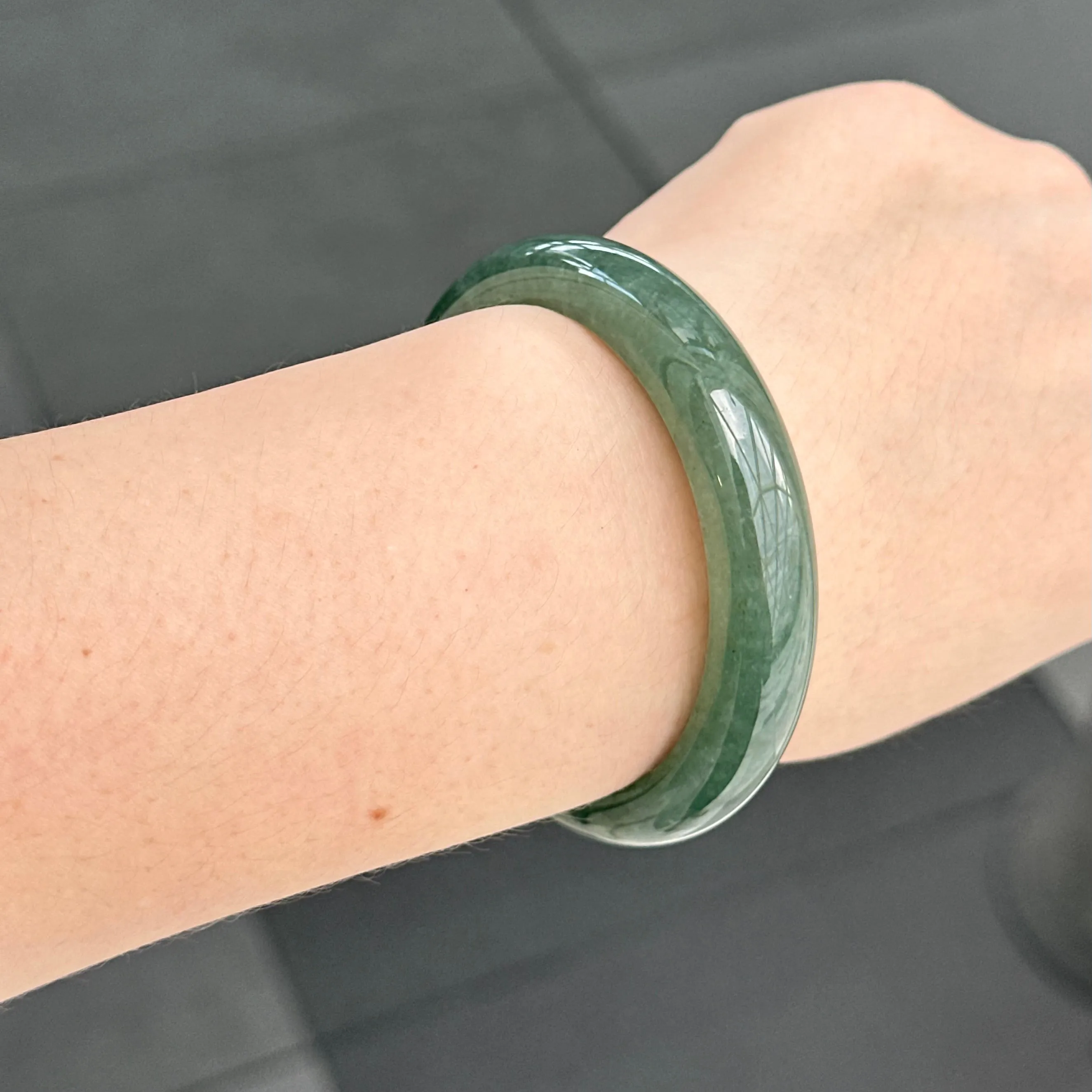 31957 56.6mm Emerald Ocean’s Whisper Bluish Green Jadeite Bangle