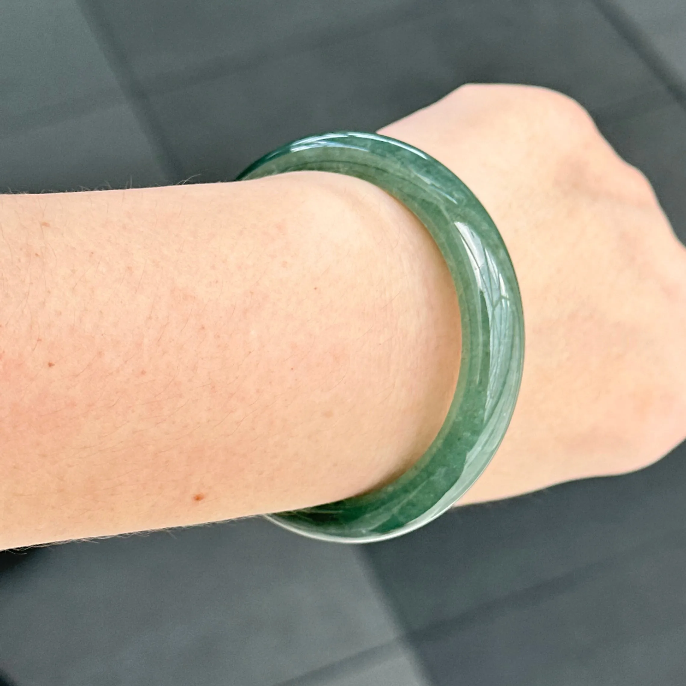 31957 56.6mm Emerald Ocean’s Whisper Bluish Green Jadeite Bangle