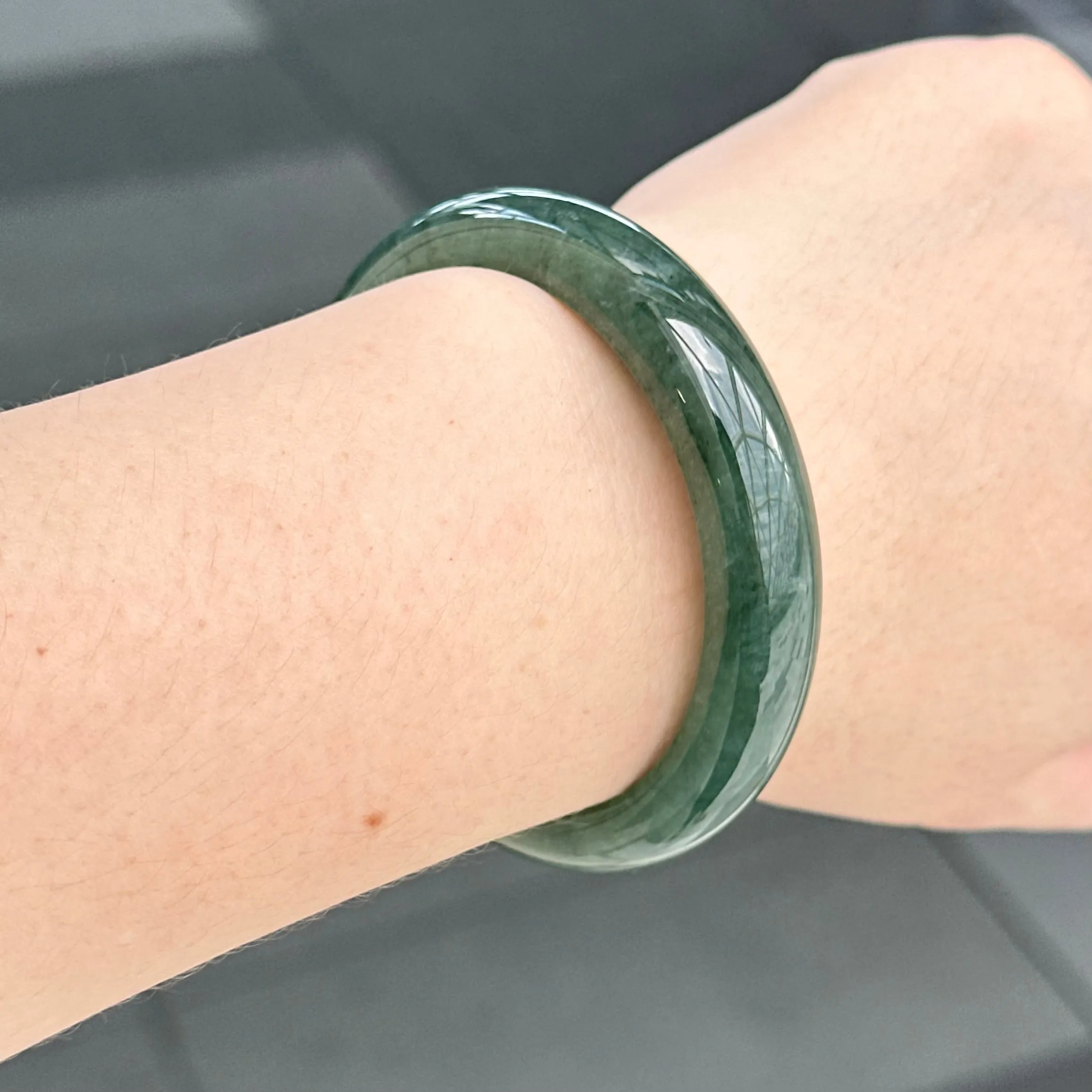 31957 56.6mm Emerald Ocean’s Whisper Bluish Green Jadeite Bangle