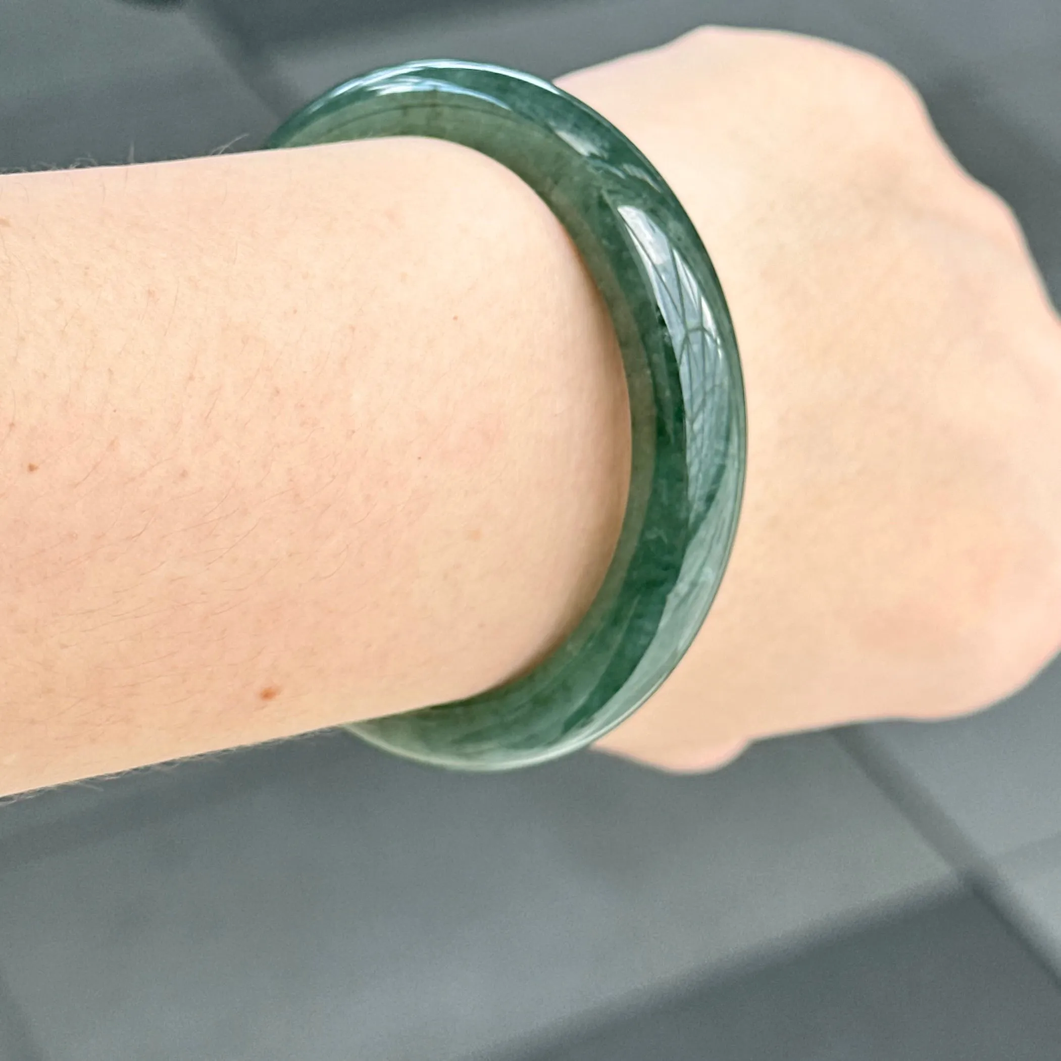 31957 56.6mm Emerald Ocean’s Whisper Bluish Green Jadeite Bangle