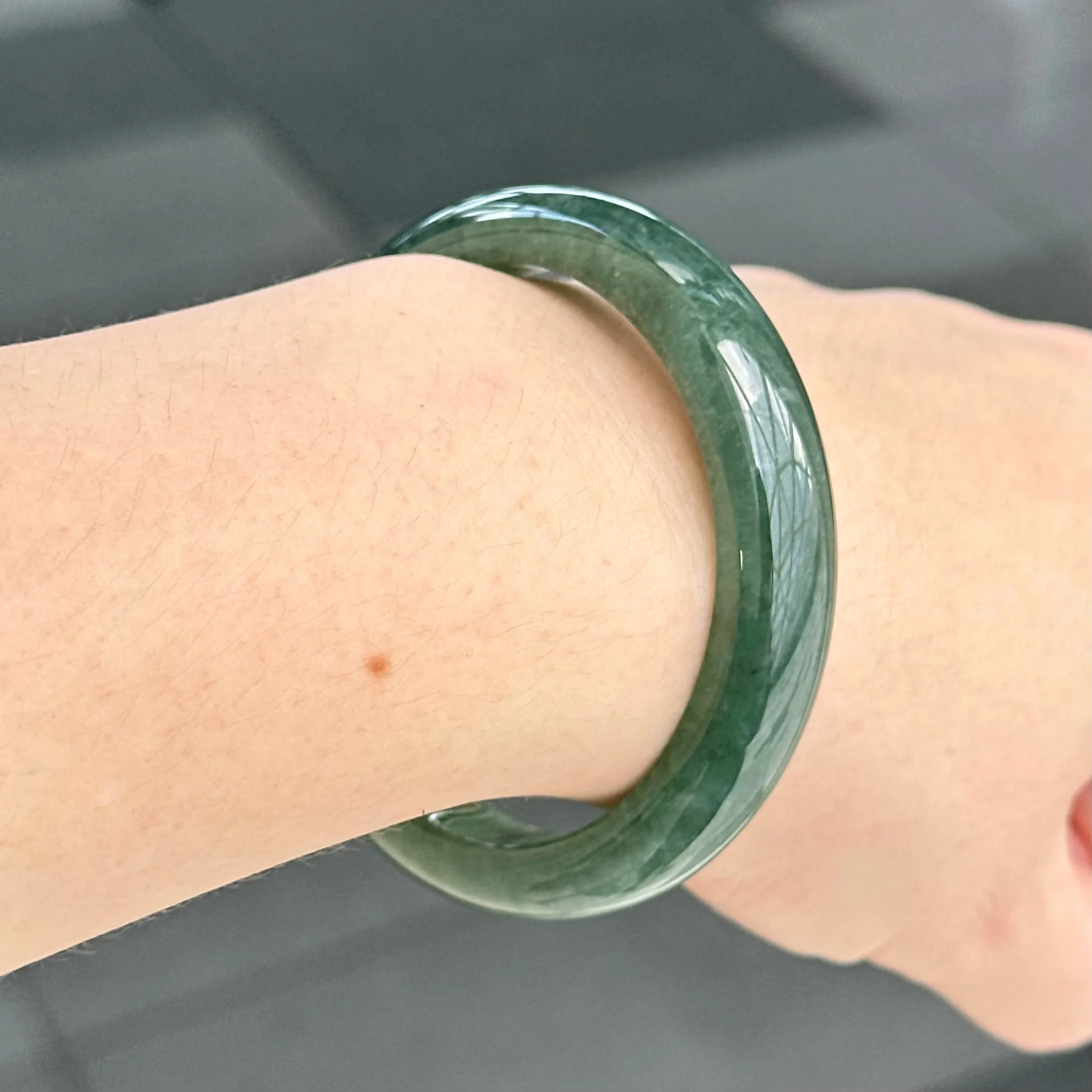 31957 56.6mm Emerald Ocean’s Whisper Bluish Green Jadeite Bangle