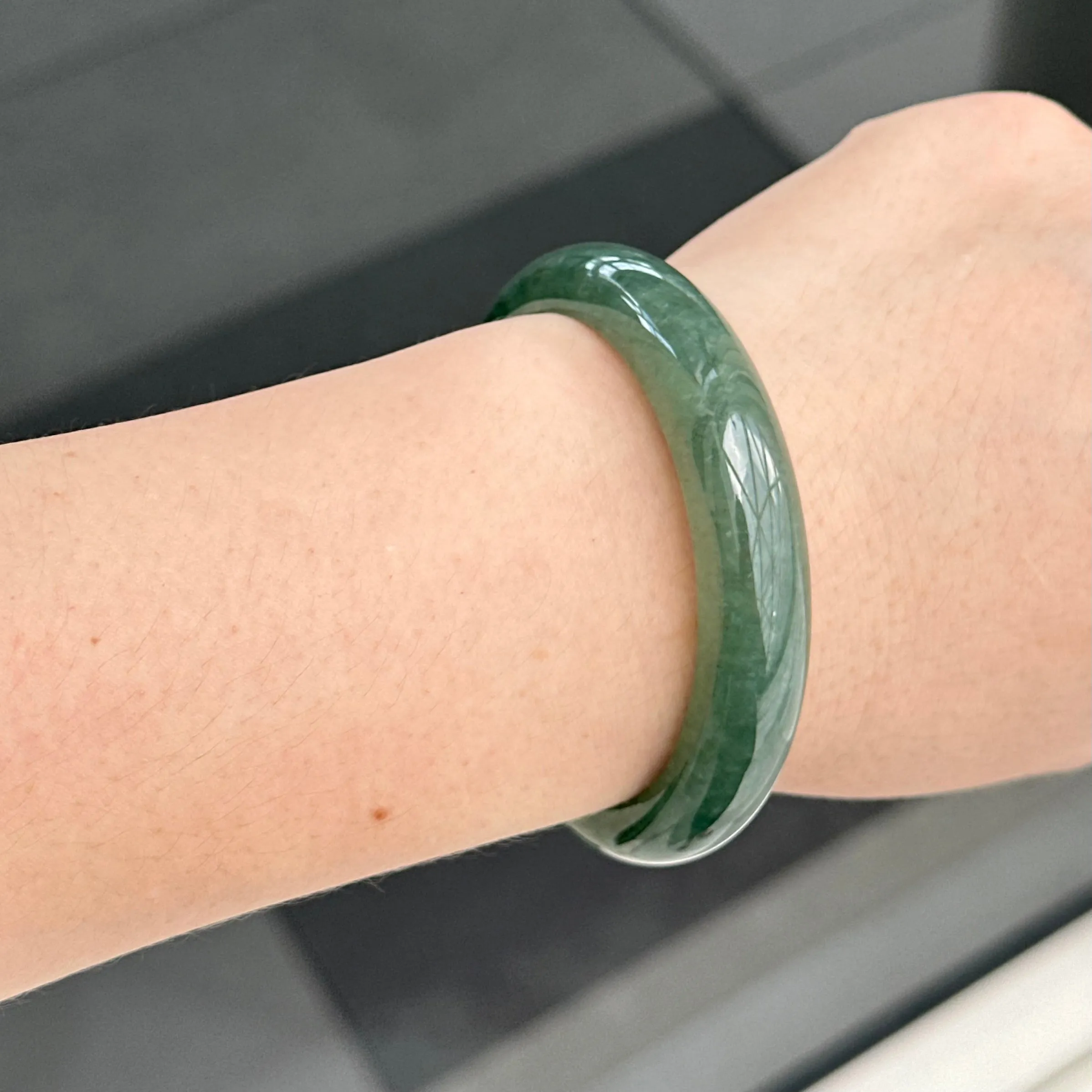 31957 56.6mm Emerald Ocean’s Whisper Bluish Green Jadeite Bangle