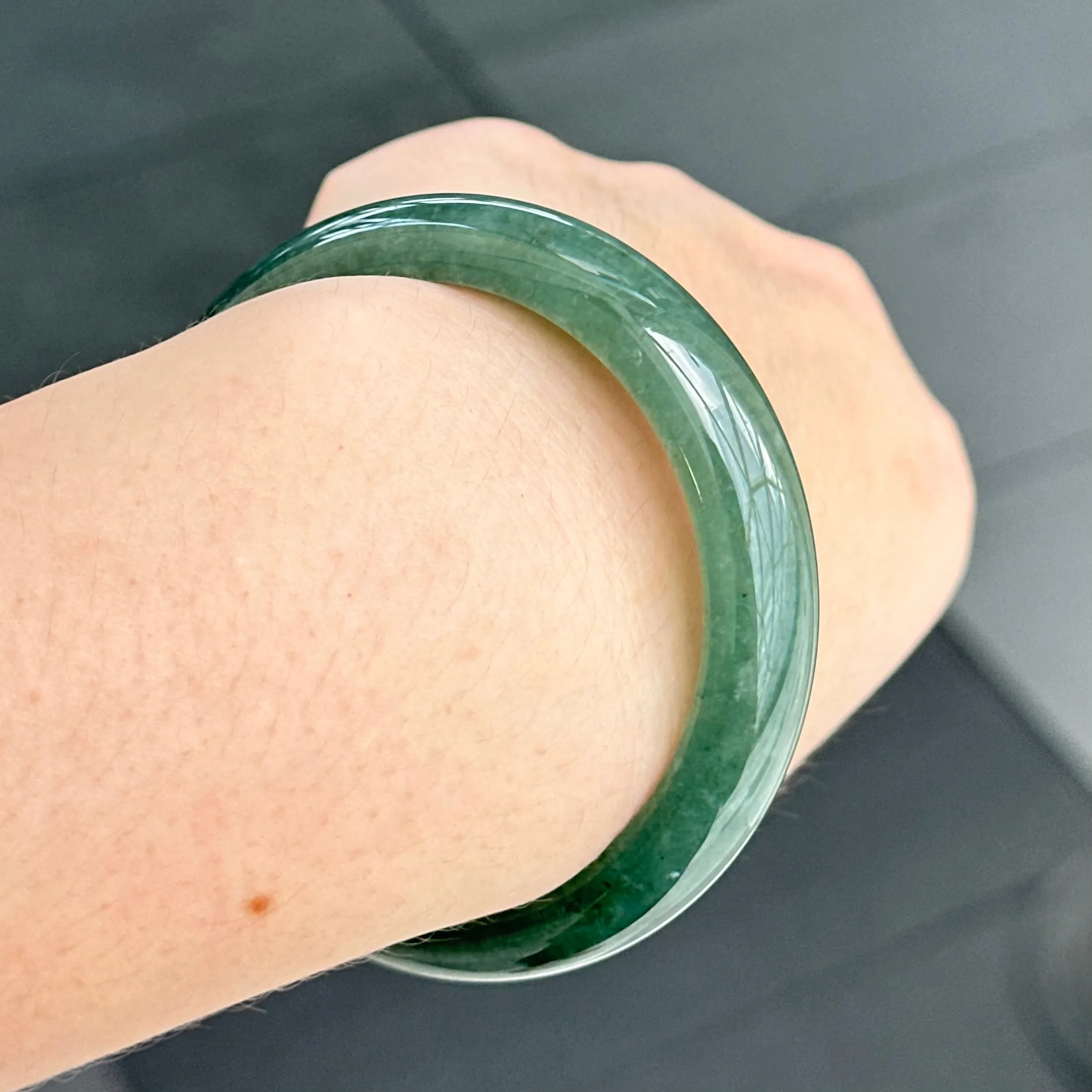 31957 56.6mm Emerald Ocean’s Whisper Bluish Green Jadeite Bangle