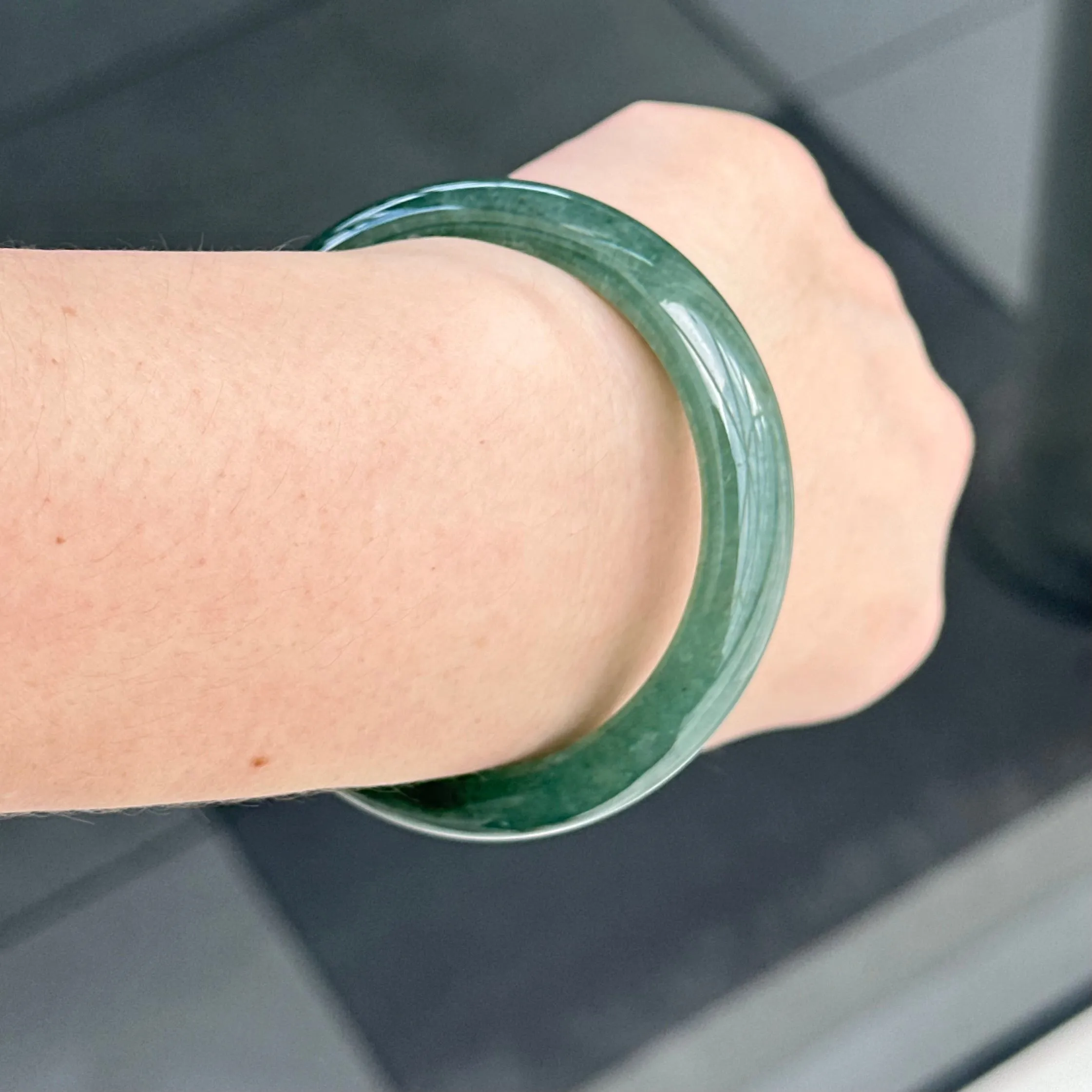 31957 56.6mm Emerald Ocean’s Whisper Bluish Green Jadeite Bangle