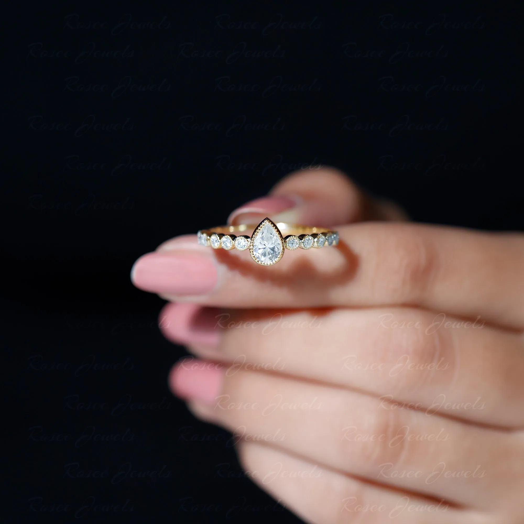 Bezel Set Pear Cut Moissanite Solitaire Ring