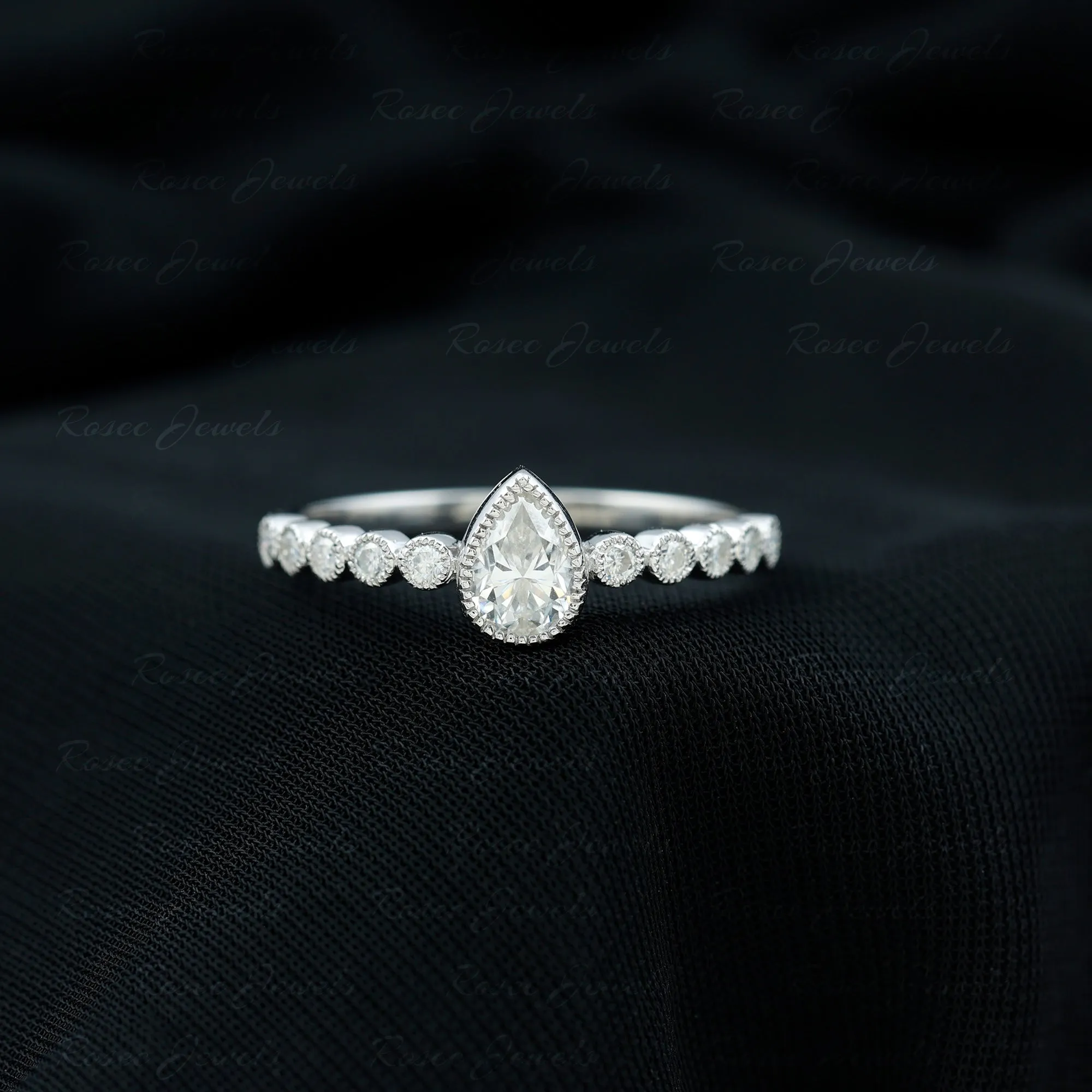 Bezel Set Pear Cut Moissanite Solitaire Ring