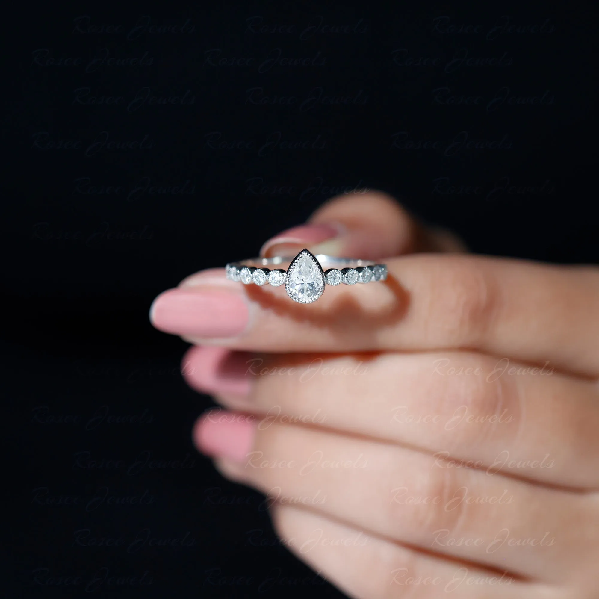 Bezel Set Pear Cut Moissanite Solitaire Ring