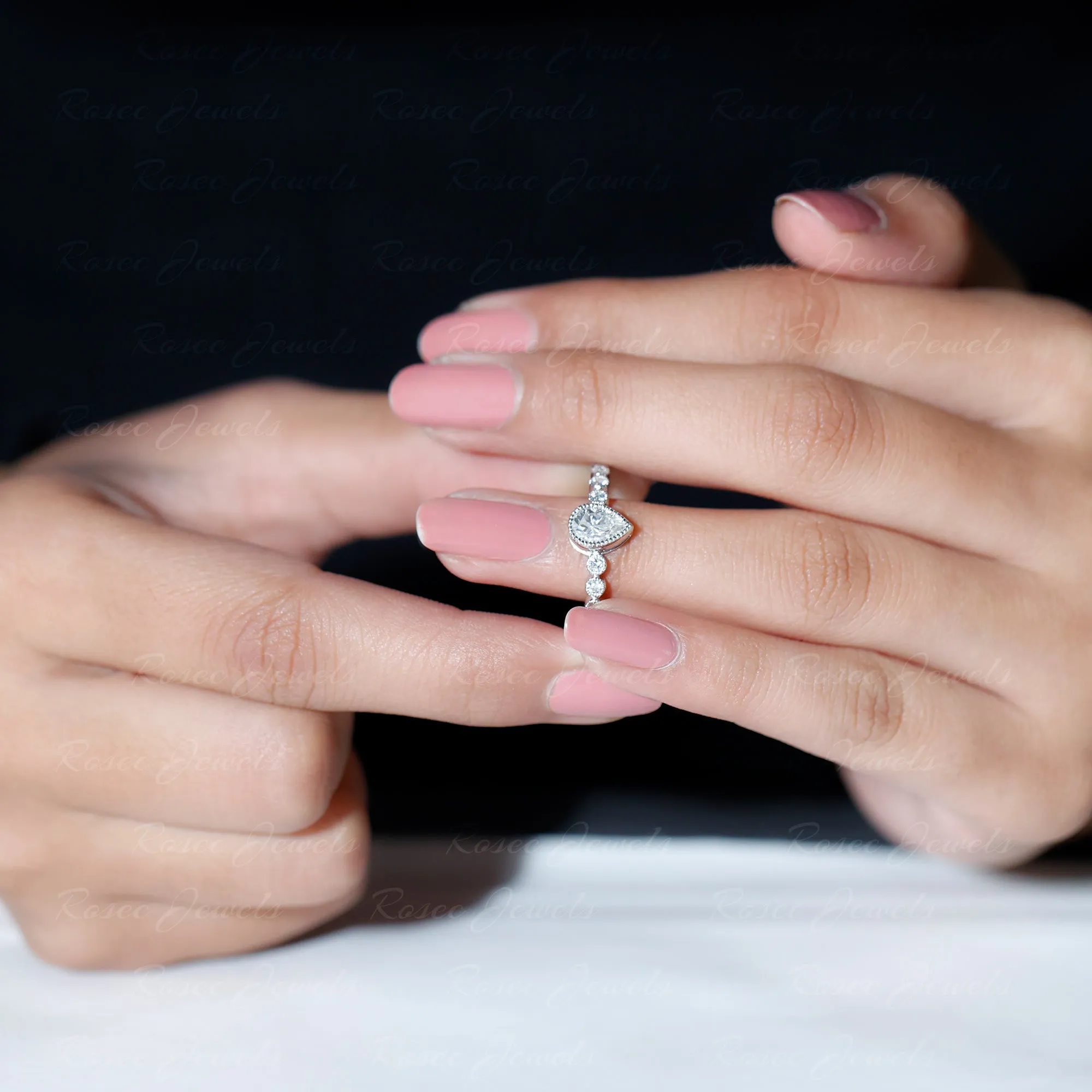 Bezel Set Pear Cut Moissanite Solitaire Ring
