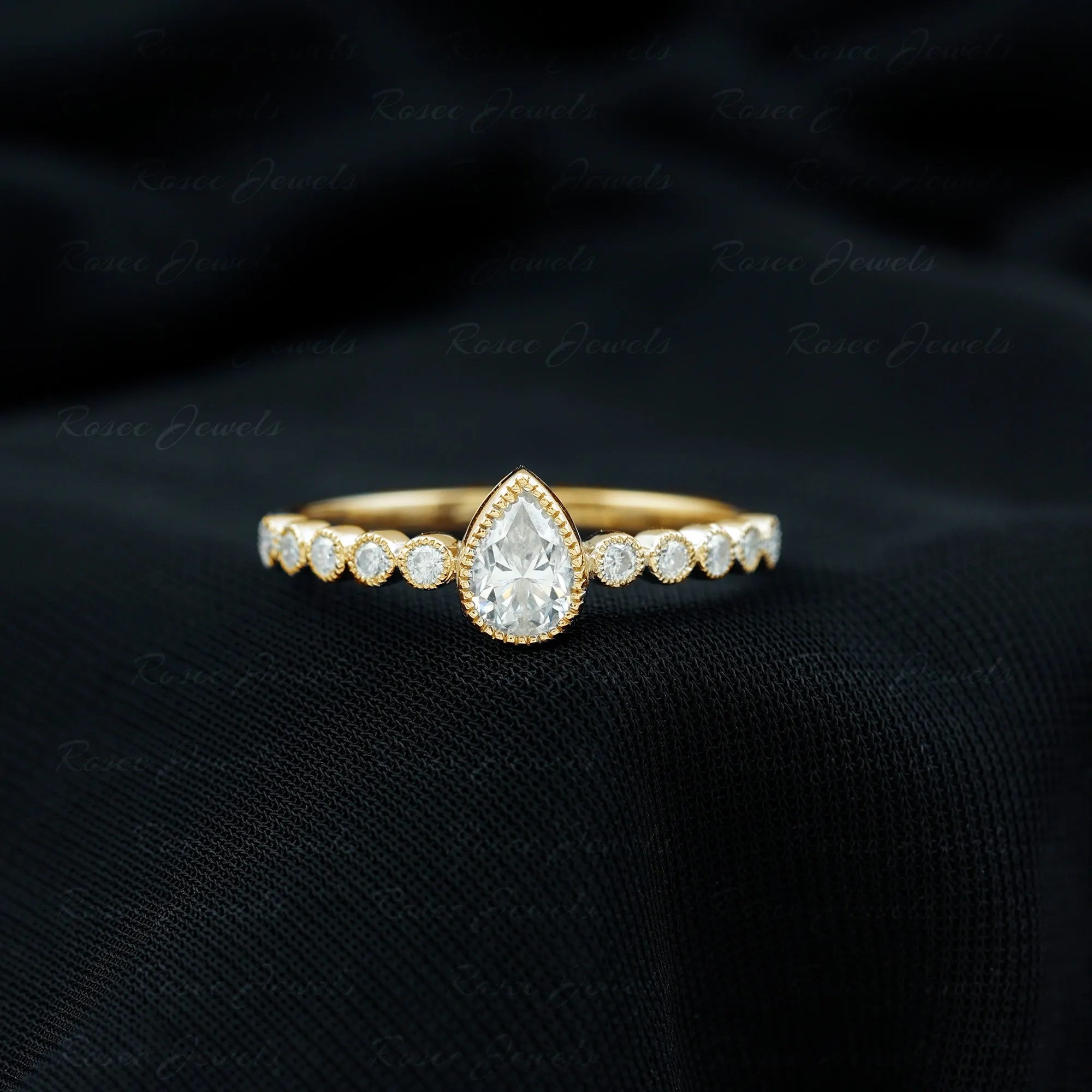 Bezel Set Pear Cut Moissanite Solitaire Ring