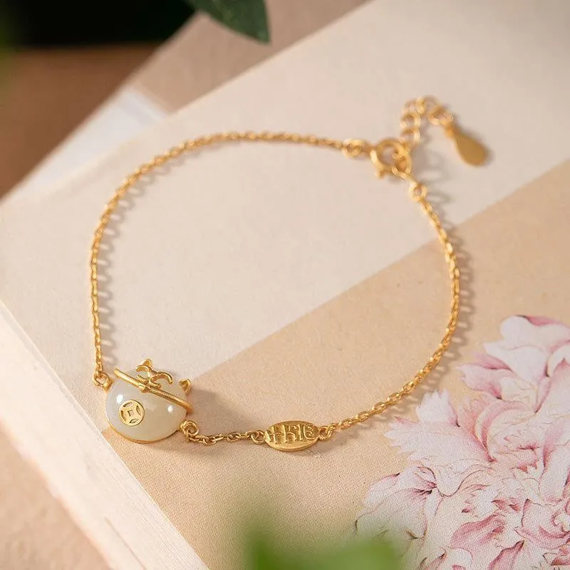 Inspired design gilt inlaid natural Hetian jade cat bracelet