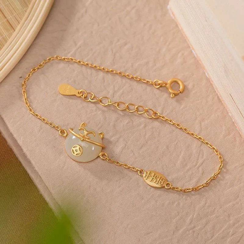 Inspired design gilt inlaid natural Hetian jade cat bracelet